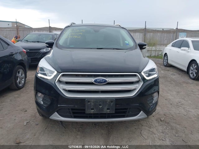 12703635 :رقم المزاد ، 1FMCU9J93JUB91762 vin ، 2018 Ford Escape Titanium مزاد بيع