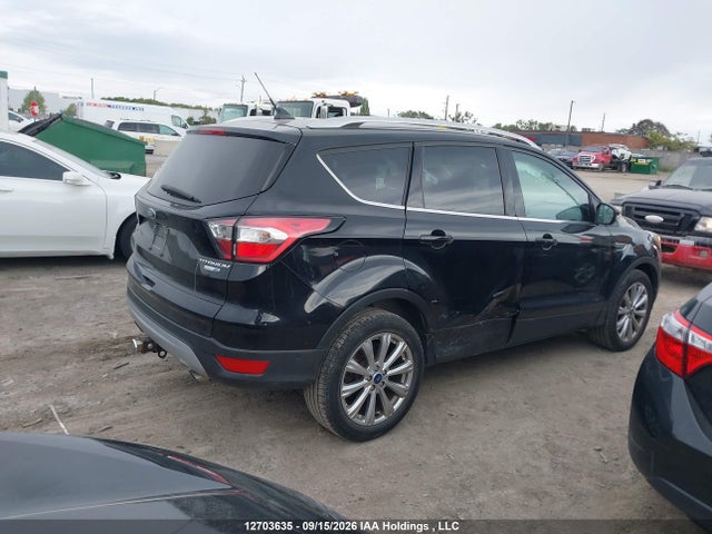 12703635 :رقم المزاد ، 1FMCU9J93JUB91762 vin ، 2018 Ford Escape Titanium مزاد بيع