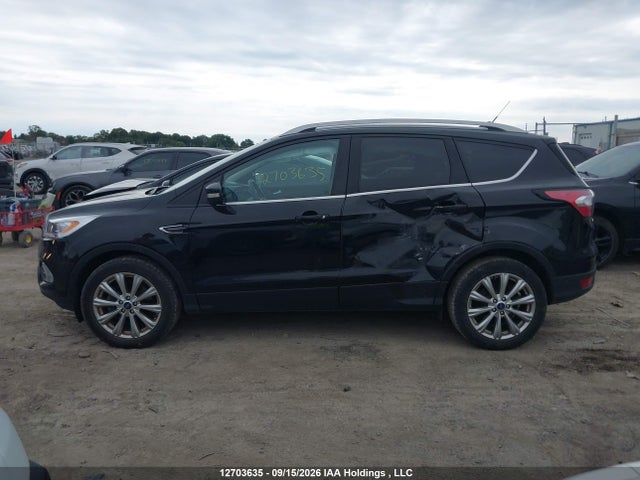 12703635 :رقم المزاد ، 1FMCU9J93JUB91762 vin ، 2018 Ford Escape Titanium مزاد بيع