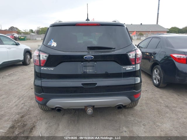 12703635 :رقم المزاد ، 1FMCU9J93JUB91762 vin ، 2018 Ford Escape Titanium مزاد بيع