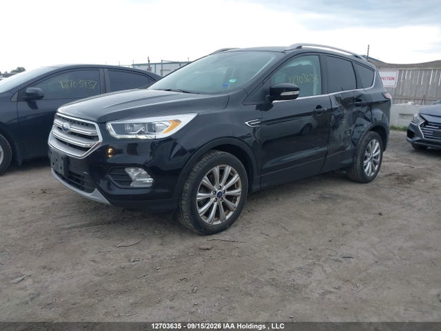 12703635 :رقم المزاد ، 1FMCU9J93JUB91762 vin ، 2018 Ford Escape Titanium مزاد بيع