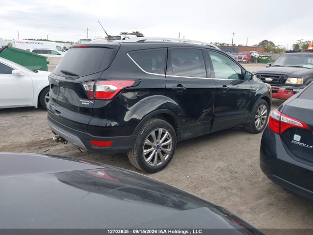 12703635 :رقم المزاد ، 1FMCU9J93JUB91762 vin ، 2018 Ford Escape Titanium مزاد بيع