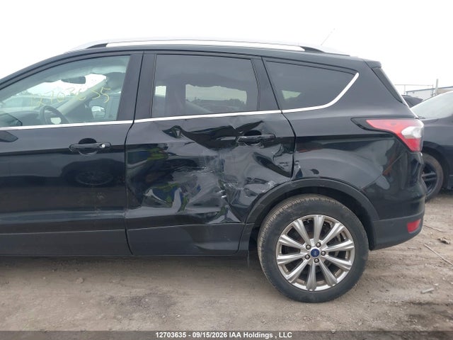 12703635 :رقم المزاد ، 1FMCU9J93JUB91762 vin ، 2018 Ford Escape Titanium مزاد بيع