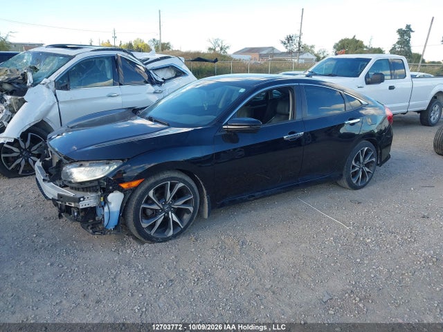 2020 Honda Civic Touring მანქანა იყიდება აუქციონზე, vin: 2HGFC1F99LH102086, აუქციონის ნომერი: 12703772