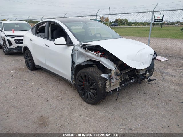 12704086 :رقم المزاد ، 7SAYGDEE7PF689592 vin ، 2023 Tesla Model Y مزاد بيع