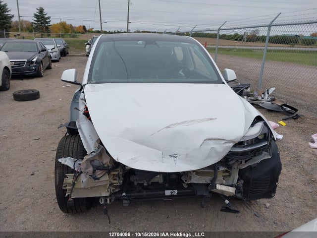 12704086 :رقم المزاد ، 7SAYGDEE7PF689592 vin ، 2023 Tesla Model Y مزاد بيع