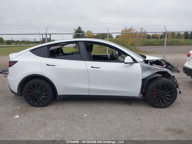 12704086 :رقم المزاد ، 7SAYGDEE7PF689592 vin ، 2023 Tesla Model Y مزاد بيع