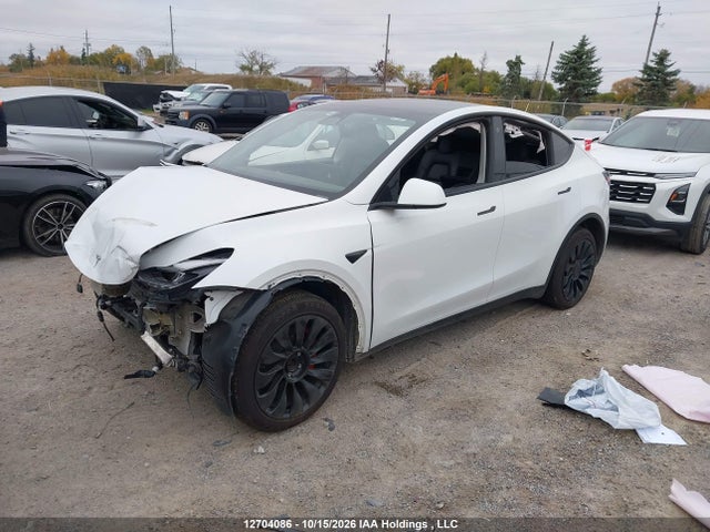12704086 :رقم المزاد ، 7SAYGDEE7PF689592 vin ، 2023 Tesla Model Y مزاد بيع
