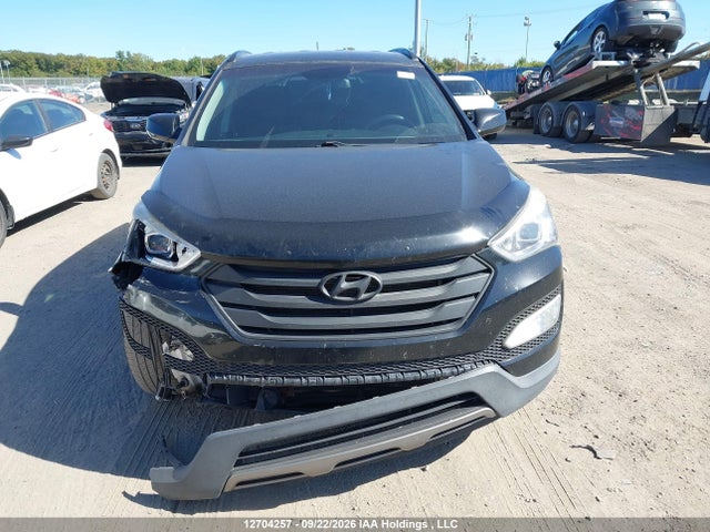 Продажа на аукционе авто 2014 Hyundai Santa Fe Sport 2.4 Premium, vin: 5XYZUDLB9EG183304, номер лота: 12704257