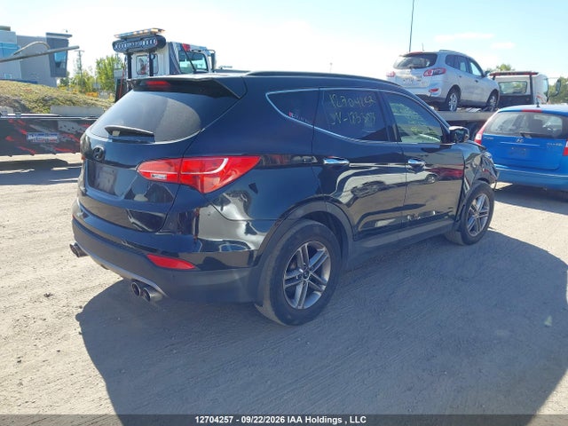 Продажа на аукционе авто 2014 Hyundai Santa Fe Sport 2.4 Premium, vin: 5XYZUDLB9EG183304, номер лота: 12704257