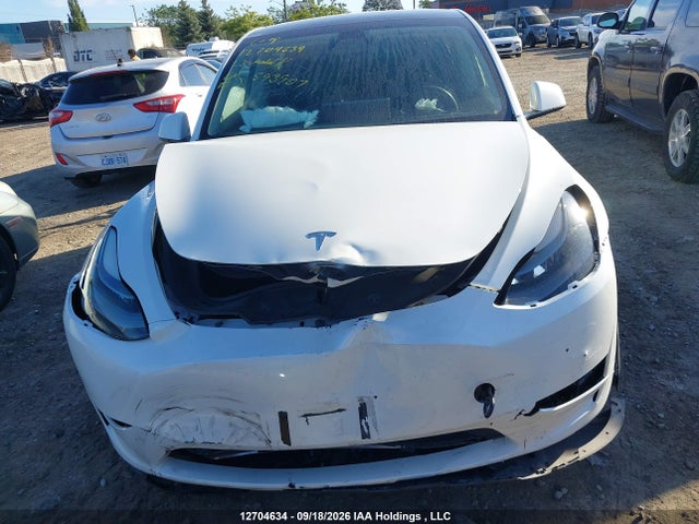 12704634 :رقم المزاد ، 7SAYGDEE8PF593907 vin ، 2023 Tesla Model Y Long Range مزاد بيع