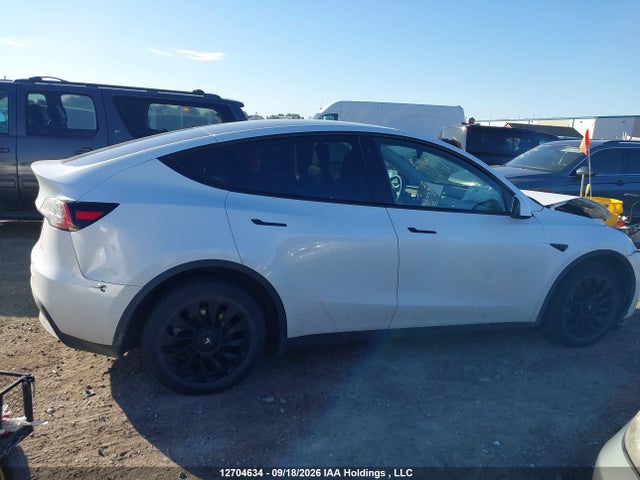 12704634 :رقم المزاد ، 7SAYGDEE8PF593907 vin ، 2023 Tesla Model Y Long Range مزاد بيع