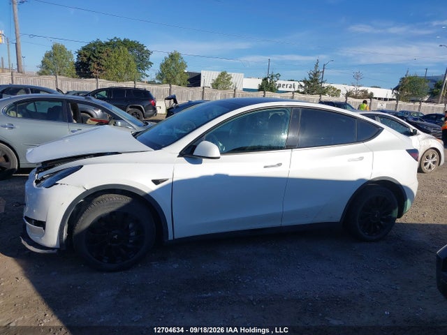 12704634 :رقم المزاد ، 7SAYGDEE8PF593907 vin ، 2023 Tesla Model Y Long Range مزاد بيع