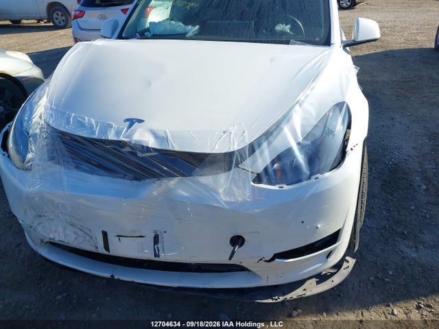 12704634 :رقم المزاد ، 7SAYGDEE8PF593907 vin ، 2023 Tesla Model Y Long Range مزاد بيع
