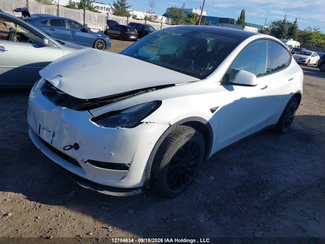 12704634 :رقم المزاد ، 7SAYGDEE8PF593907 vin ، 2023 Tesla Model Y Long Range مزاد بيع
