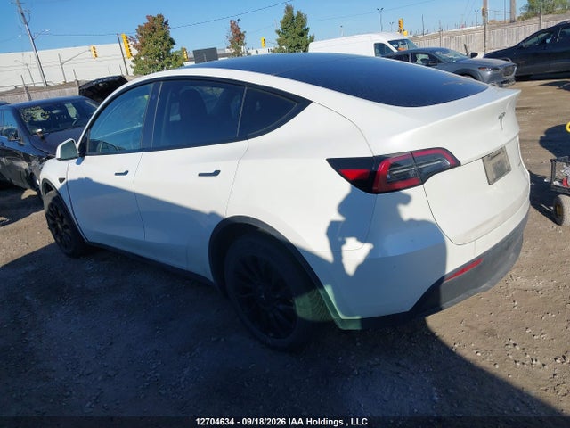 12704634 :رقم المزاد ، 7SAYGDEE8PF593907 vin ، 2023 Tesla Model Y Long Range مزاد بيع