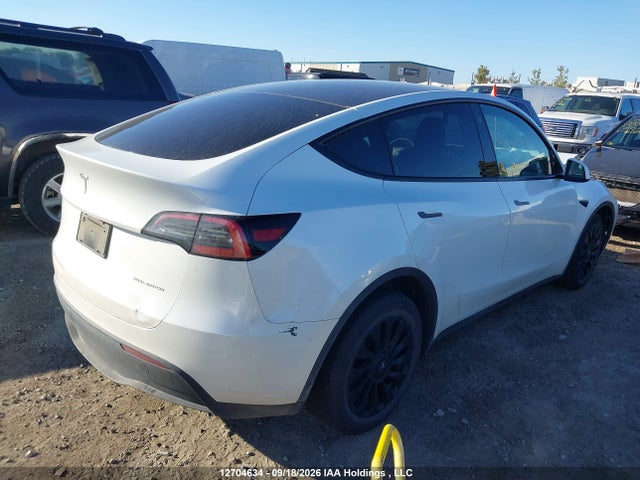 12704634 :رقم المزاد ، 7SAYGDEE8PF593907 vin ، 2023 Tesla Model Y Long Range مزاد بيع
