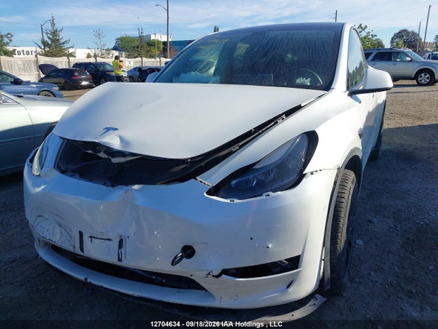 12704634 :رقم المزاد ، 7SAYGDEE8PF593907 vin ، 2023 Tesla Model Y Long Range مزاد بيع