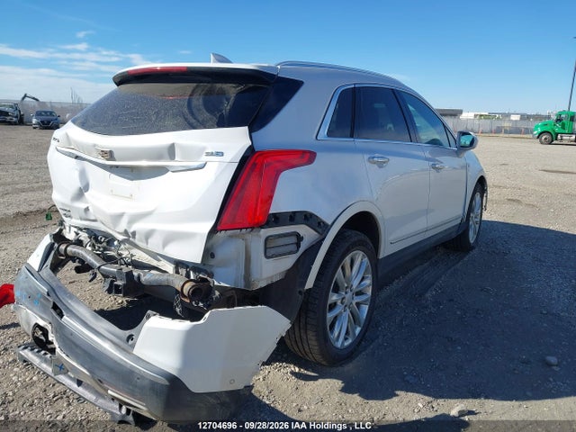12704696 :رقم المزاد ، 1GYKNFRS4HZ165584 vin ، 2017 Cadillac Xt5 Platinum مزاد بيع