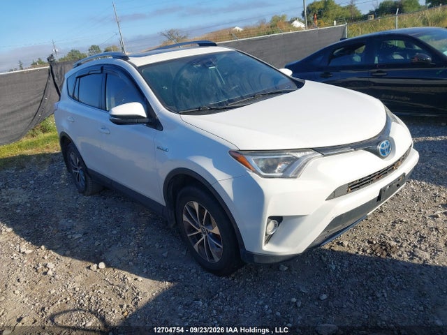 Auction sale of the 2018 Toyota Rav4 Hybrid Le+, vin: JTMRJREV0JD206085, lot number: 12704754