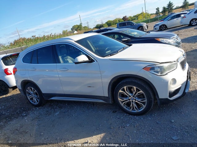 12706309 :رقم المزاد ، WBXHT3C3XH5F73591 vin ، 2017 Bmw X1 مزاد بيع