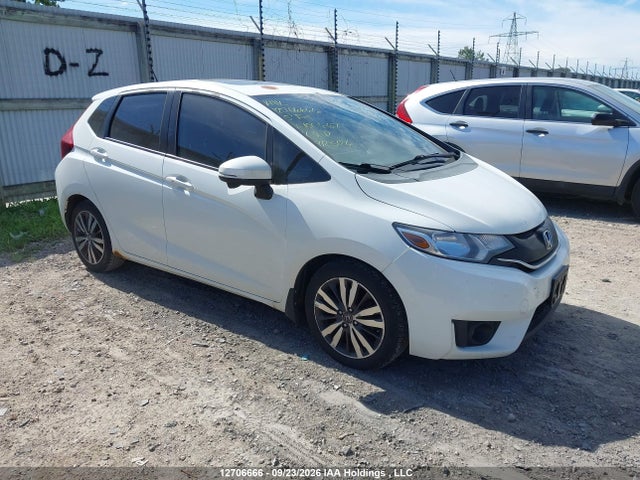 2015 Honda Fit Ex/ex-l Navi მანქანა იყიდება აუქციონზე, vin: 3HGGK5H87FM100667, აუქციონის ნომერი: 12706666