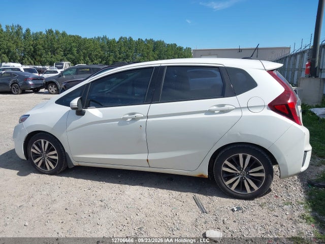 2015 Honda Fit Ex/ex-l Navi მანქანა იყიდება აუქციონზე, vin: 3HGGK5H87FM100667, აუქციონის ნომერი: 12706666