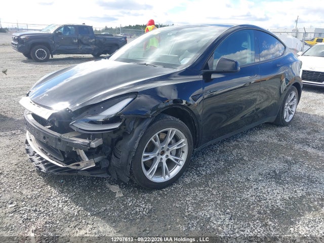 Tesla Model Y Long Range 2024 7SAYGDEE2RF073110 Image 2