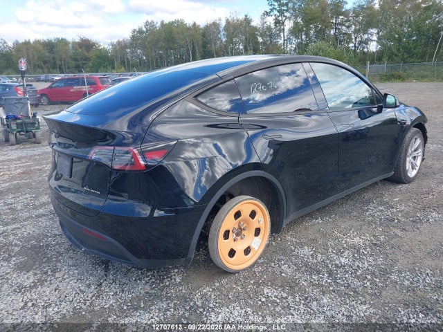 Tesla Model Y Long Range 2024 7SAYGDEE2RF073110 Image 4