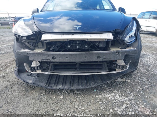 Tesla Model Y Long Range 2024 7SAYGDEE2RF073110 Image 6