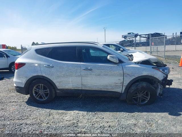12707654 :رقم المزاد ، 5XYZUDLB3HG391151 vin ، 2017 Hyundai Santa Fe Sport 2.4 Luxury/2.4 Premium/2.4 Se مزاد بيع