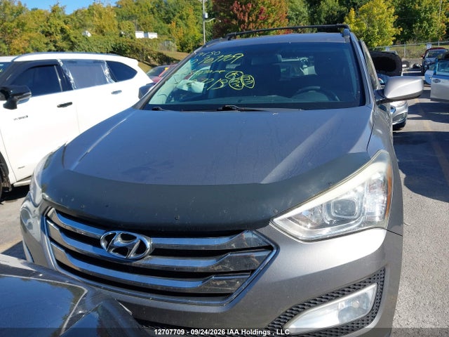2014 Hyundai Santa Fe Sport მანქანა იყიდება აუქციონზე, vin: 5XYZU3LB9EG127213, აუქციონის ნომერი: 12707709