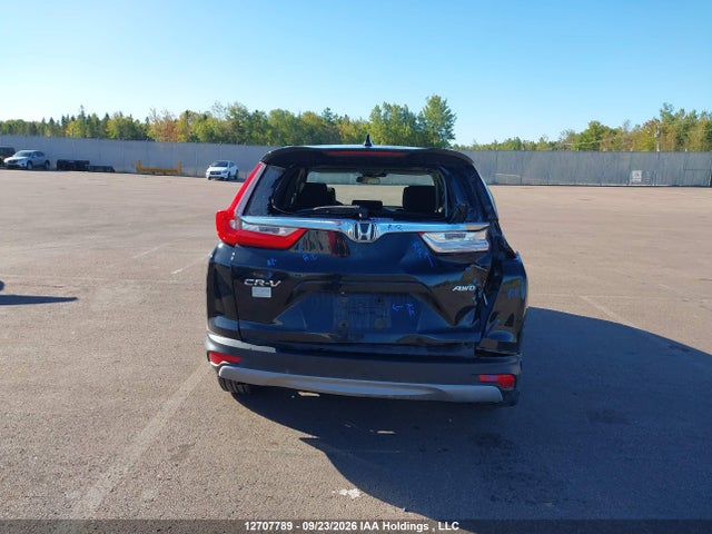 12707789 :رقم المزاد ، 2HKRW2H52KH119059 vin ، 2019 Honda Cr-v Ex مزاد بيع