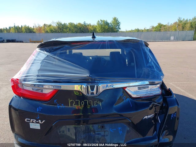 12707789 :رقم المزاد ، 2HKRW2H52KH119059 vin ، 2019 Honda Cr-v Ex مزاد بيع