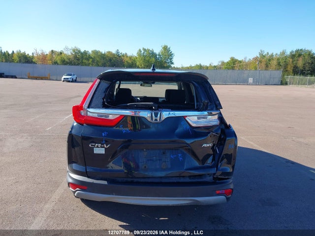 12707789 :رقم المزاد ، 2HKRW2H52KH119059 vin ، 2019 Honda Cr-v Ex مزاد بيع