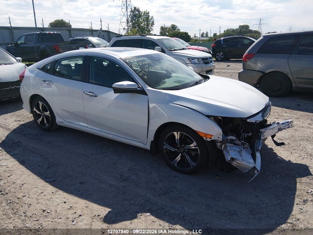 Продажа на аукционе авто 2018 Honda Civic Touring, vin: 2HGFC1F94JH100775, номер лота: 12707840