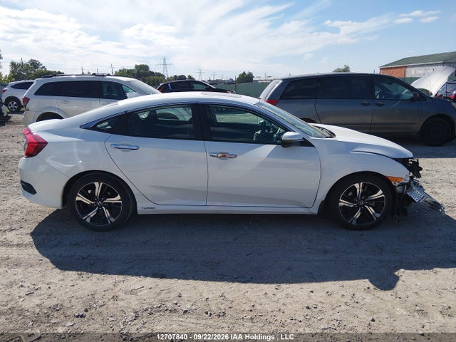 Продажа на аукционе авто 2018 Honda Civic Touring, vin: 2HGFC1F94JH100775, номер лота: 12707840