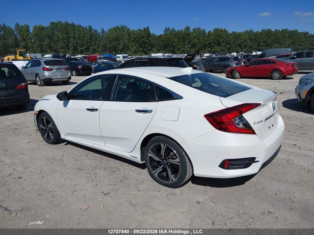 Продажа на аукционе авто 2018 Honda Civic Touring, vin: 2HGFC1F94JH100775, номер лота: 12707840