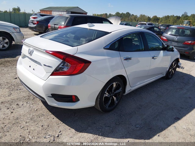 Продажа на аукционе авто 2018 Honda Civic Touring, vin: 2HGFC1F94JH100775, номер лота: 12707840