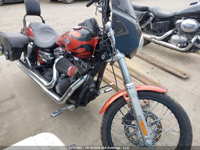 12707863 :رقم المزاد ، 5HD1GP4A5BC306065 vin ، 2011 Harley-davidson Fxdwg مزاد بيع