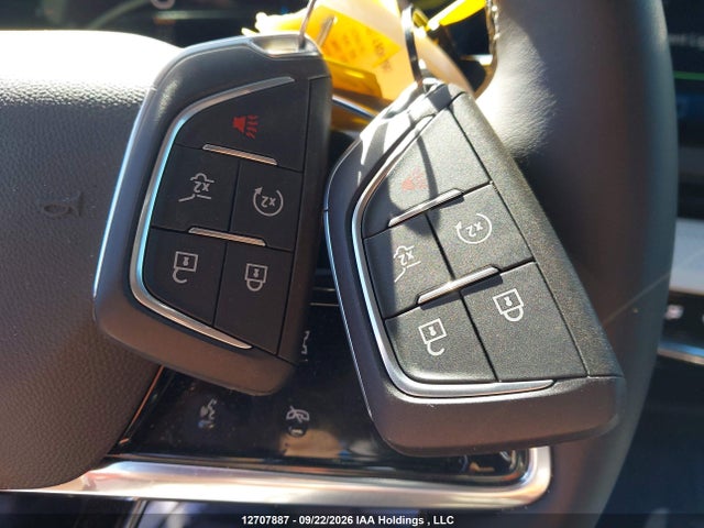 2026 Cadillac Optiq Premium Sport მანქანა იყიდება აუქციონზე, vin: 3GYK3GM44TS113107, აუქციონის ნომერი: 12707887