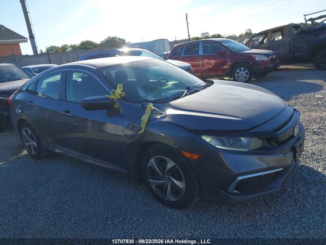 12707930 :رقم المزاد ، 2HGFC2F51MH003928 vin ، 2021 Honda Civic Lx مزاد بيع