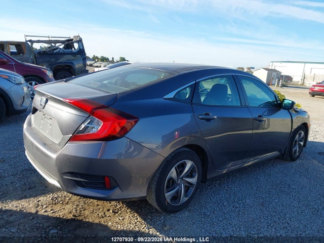 12707930 :رقم المزاد ، 2HGFC2F51MH003928 vin ، 2021 Honda Civic Lx مزاد بيع