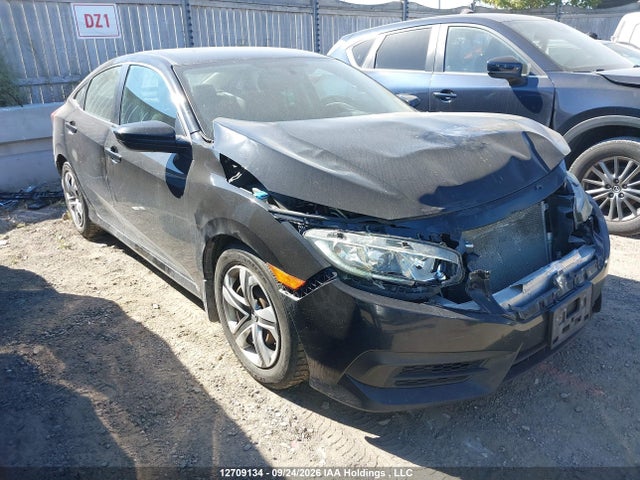 Auction sale of the 2018 Honda Civic Lx, vin: 2HGFC2F52JH011323, lot number: 12709134