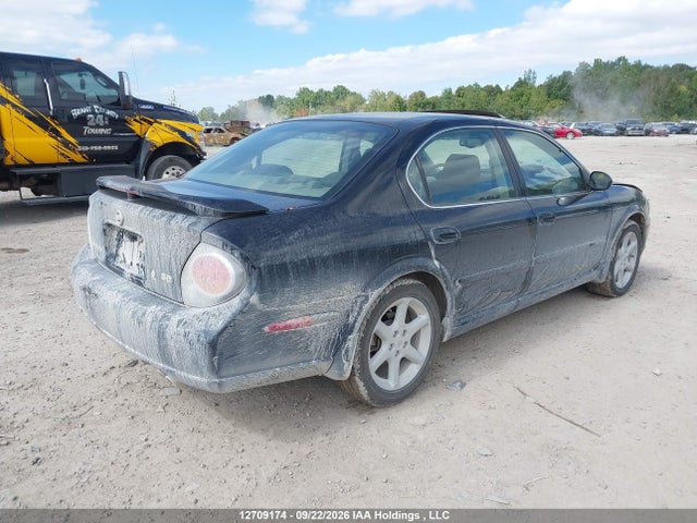 12709174 :رقم المزاد ، JN1DA31A42T324452 vin ، 2002 Nissan Maxima Se مزاد بيع