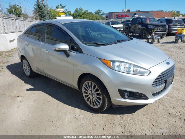 2014 Ford Fiesta Titanium მანქანა იყიდება აუქციონზე, vin: 3FADP4CJ4EM209146, აუქციონის ნომერი: 12709364
