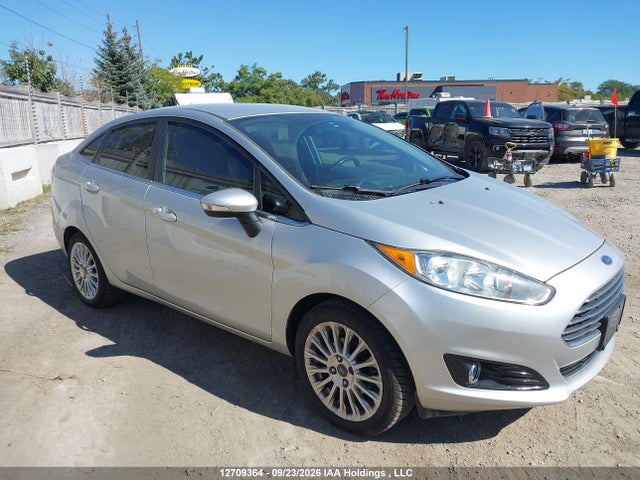 2014 Ford Fiesta Titanium მანქანა იყიდება აუქციონზე, vin: 3FADP4CJ4EM209146, აუქციონის ნომერი: 12709364