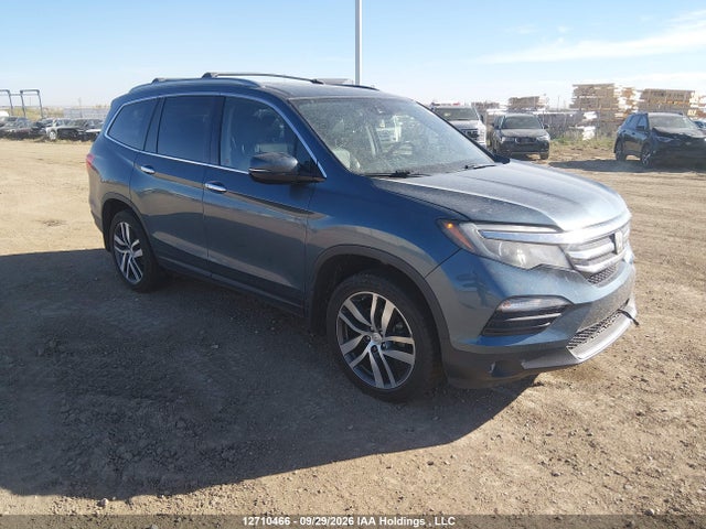 Auction sale of the 2017 Honda Pilot Touring, vin: 5FNYF6H92HB505784, lot number: 12710466