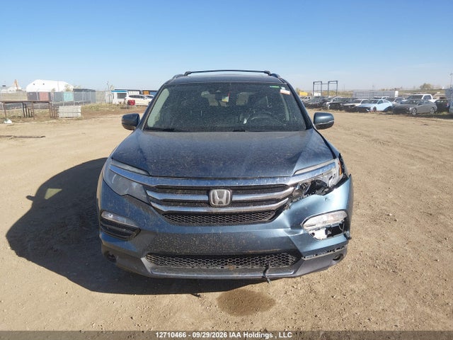 Продажа на аукционе авто 2017 Honda Pilot Touring, vin: 5FNYF6H92HB505784, номер лота: 12710466