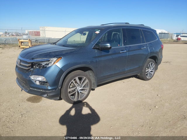 Продажа на аукционе авто 2017 Honda Pilot Touring, vin: 5FNYF6H92HB505784, номер лота: 12710466